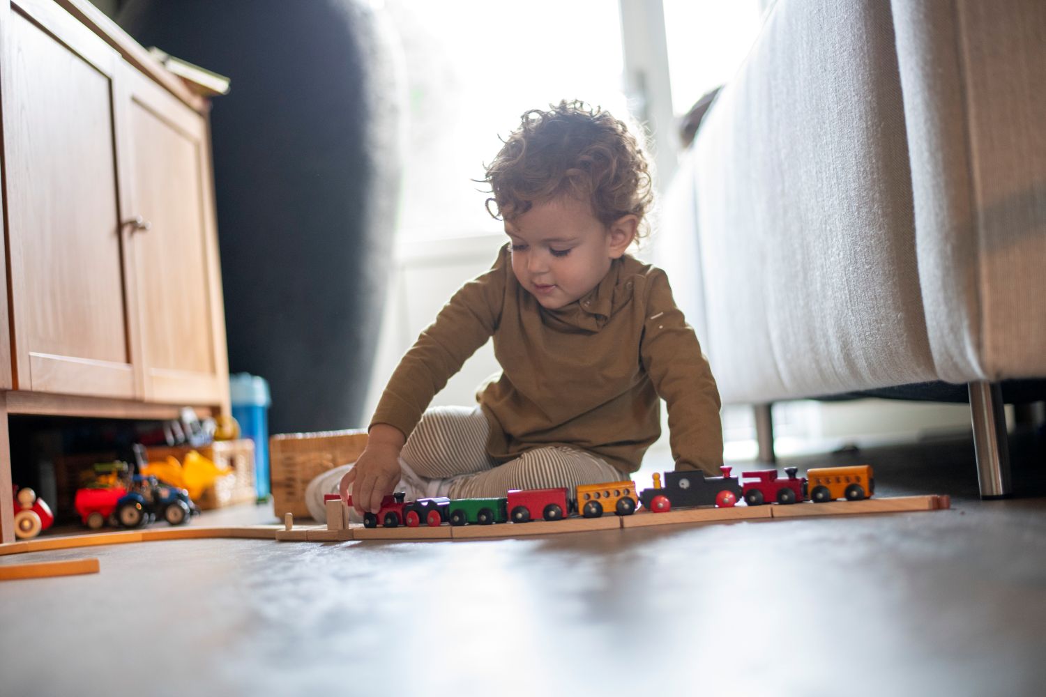 toddler playing with toys